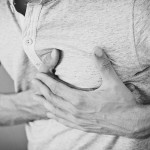 Man Grabbing Chest - Lower Heart Attack Risk in Diabetics