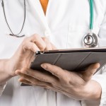 Doctor holding tablet pc - New Diabetic Neuropathy Guidelines for Doctors
